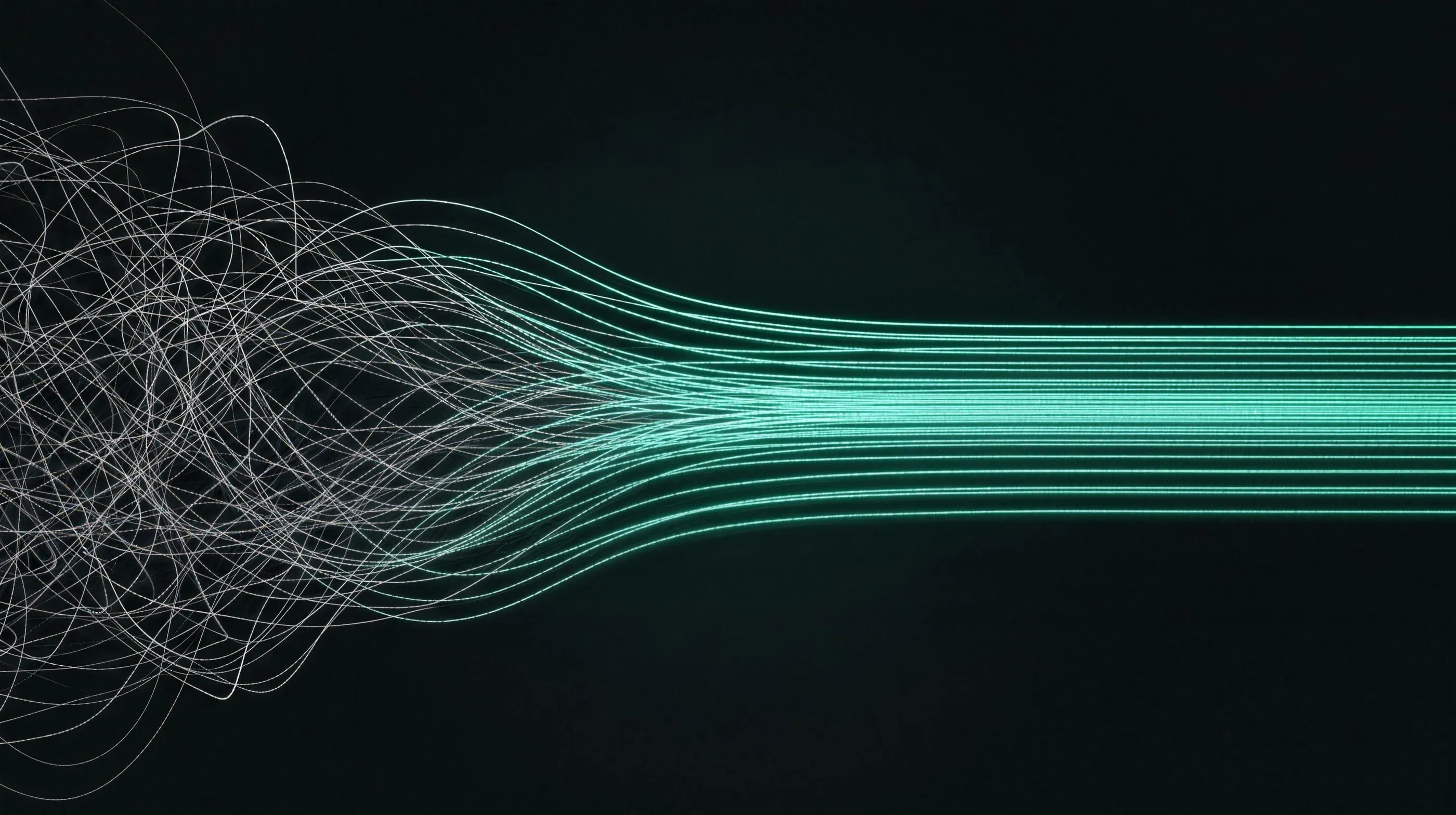 A tangle of grey threads turns into calm, parallel mint lines.